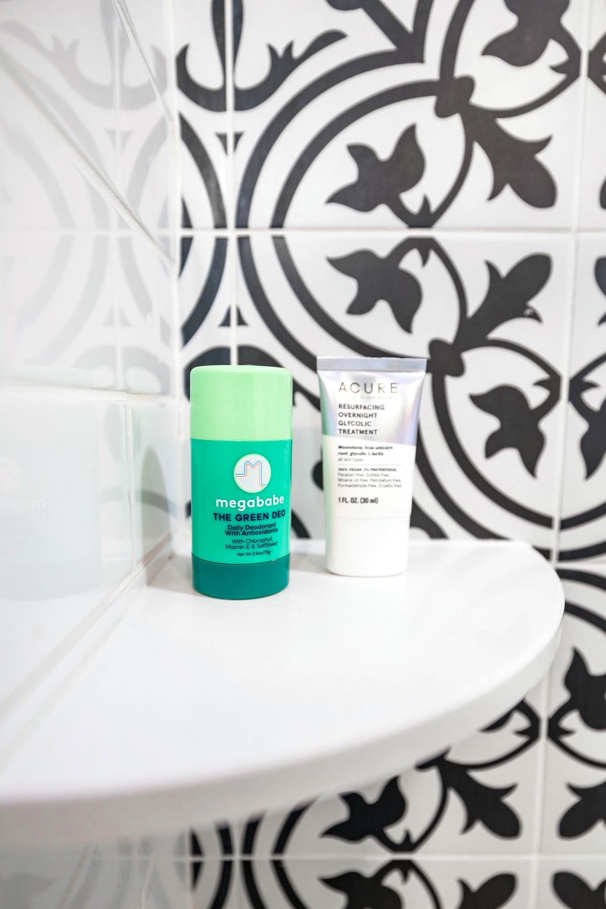 Personal care products on a bathroom shelf