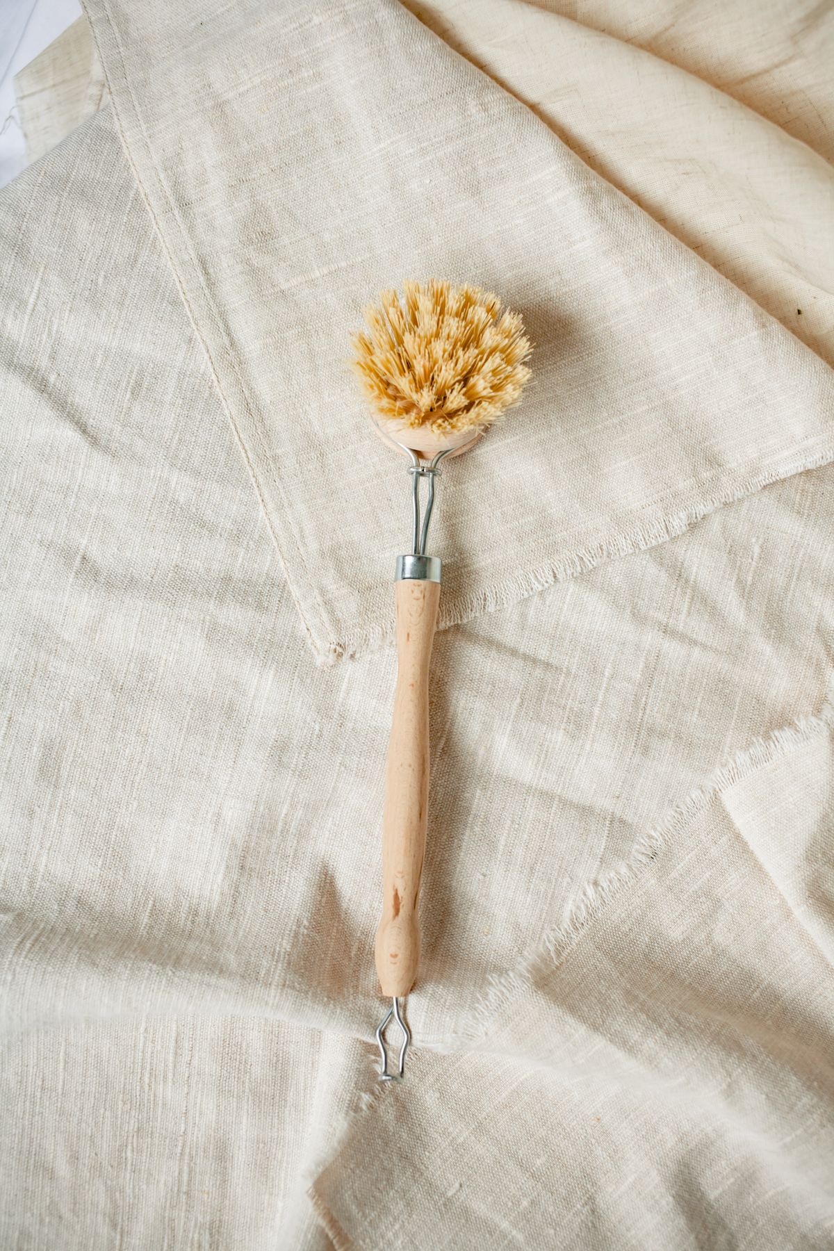 A dish brush on a cloth