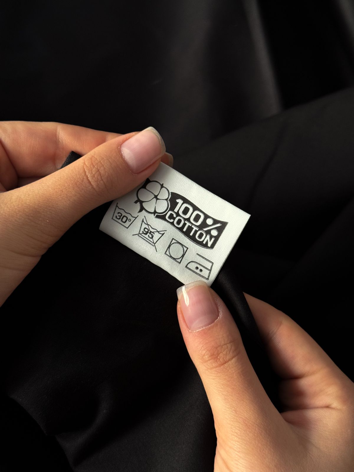A fabric composition label on clothing