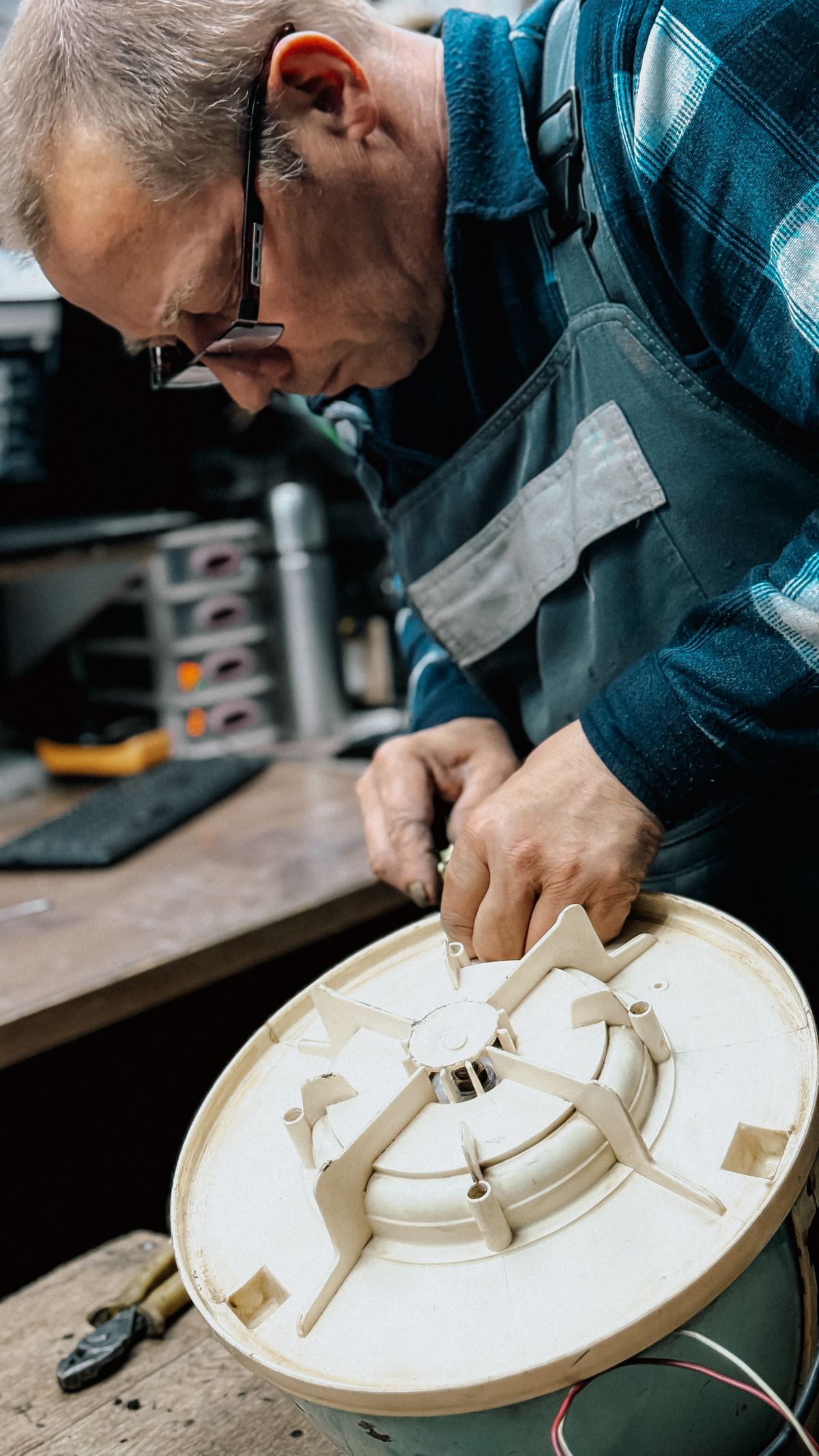 Inspecting an appliance part at a workbench