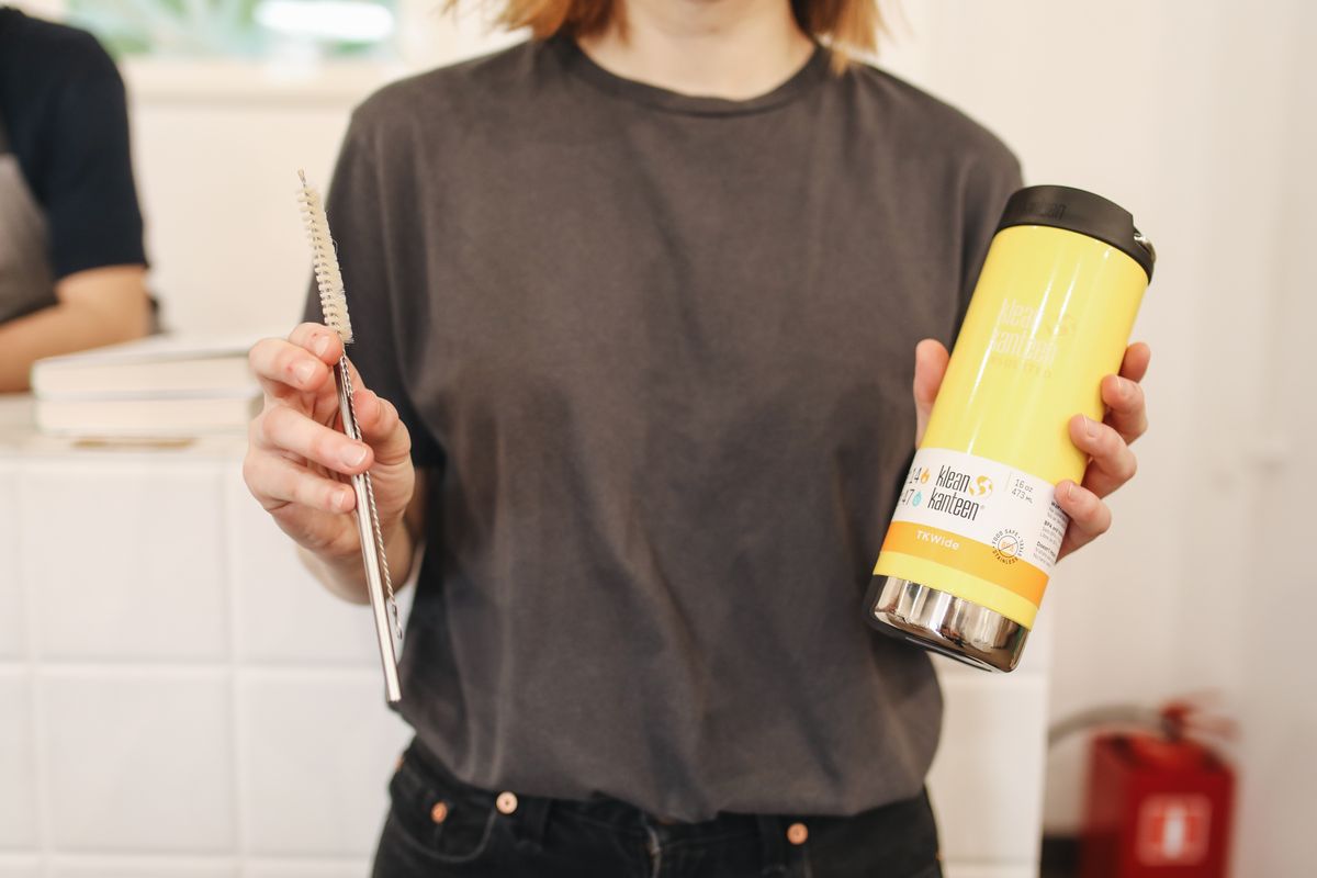 Reusable cup with a metal straw