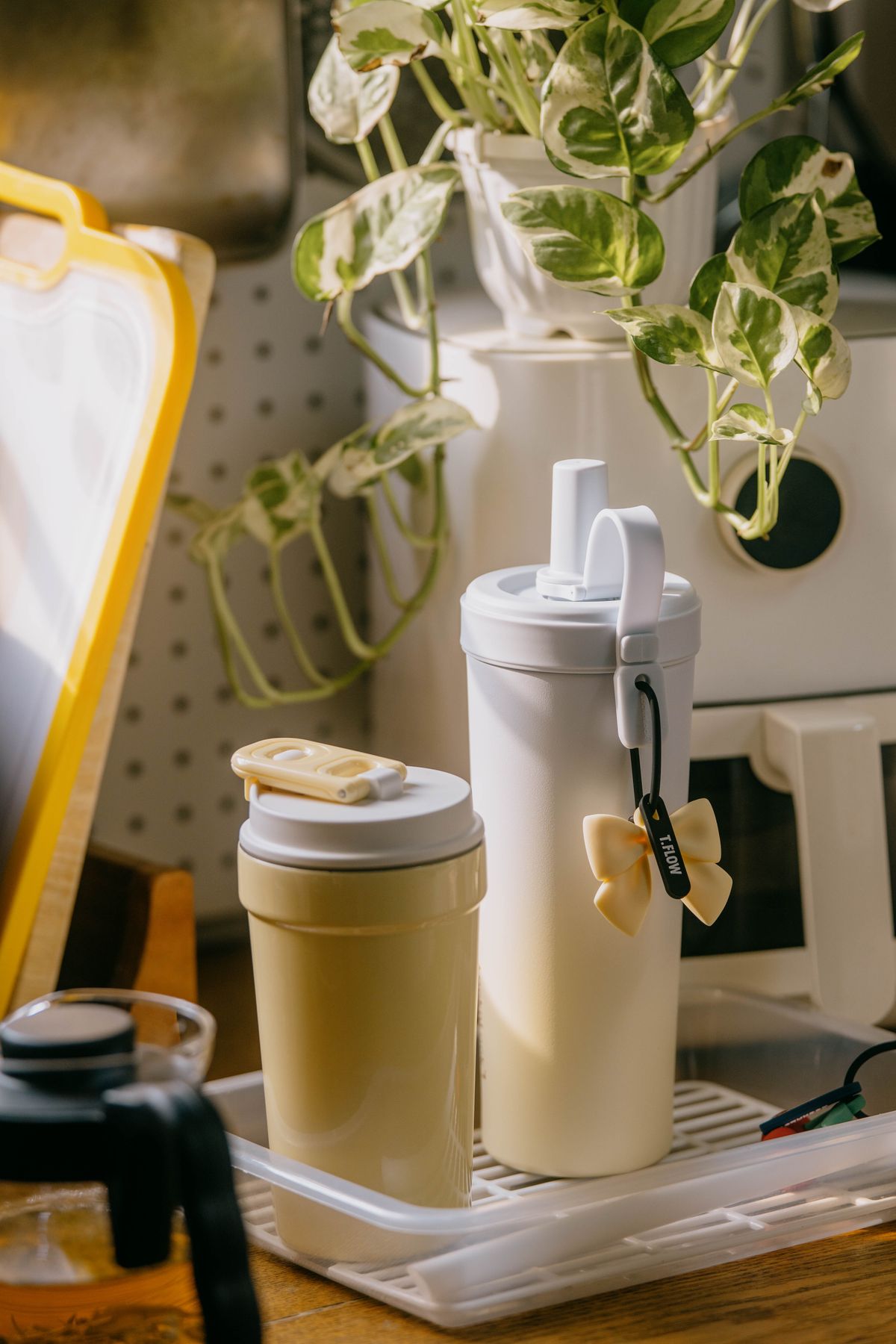 Reusable travel mugs in a kitchen